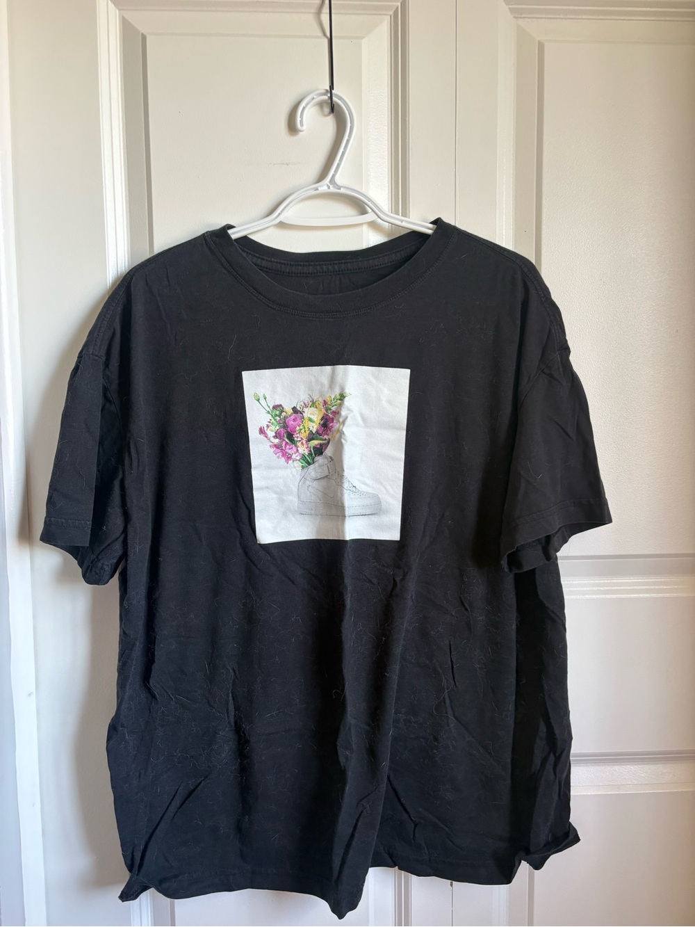 Nike Black Short-Sleeve Graphic Tee with Floral Sneaker Print